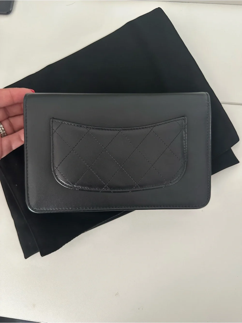 CHANEL Black Leather Clutch with Mixed Metal Chain Script